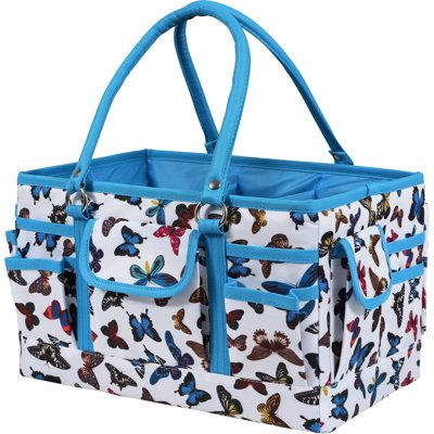 The SINGER Storage Collapsible Tote Caddy in Multicolor Butterfly Print is an ideal sewing organizer for those who crave tons of storage space to organize their sewing supplies. This spacious sewing caddy is large enough to fit an assortment of sewing supplies, accessories, and tools, and it’s the perfect tool bag to stylishly sit next to their sewing machine. The bag is divided into five spacious inner compartments, one measuring that is perfect for quantities of fabric or larger dressmaking sh Sewing Kit Bag, Sewing Organizer, Sewing Caddy, Marker Storage, Seam Rippers, Sewing Storage, Storage Tote, Sewing Essentials, Storage Caddy