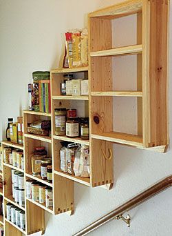 Inventory with one glance. This shallow shelving unit allows the homeowner to know what he has with just one look. Stairwell Storage, Stairway Storage, Basement Stairs Ideas, Stairs Renovation, Staircase Storage, Stair Remodel, Basement Storage, Basement Stairs, Diy Stairs