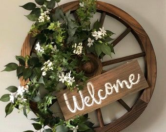 Wagon Wheel Wreath, Wagon Wheel Decor, Easter Front Door Wreath, Wheel Wreath, Magnolia Decor, Canes Decor, Ladybug Decorations, Whimsical Wreaths, Wheel Decor