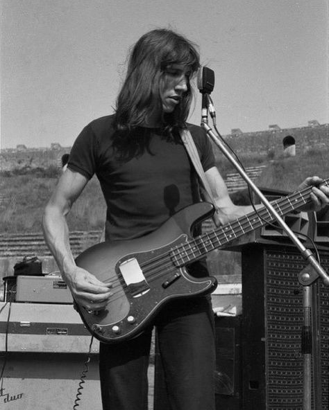 @pinkfloydbt on Instagram: “Roger Waters, live at Pompeii in 1971, (by Jacques Boumendil) . . . . . . . .  #pinkfloyd #pinkfloydfan #pinkfloydart #pinkfloydthewall…” Pink Floyd Live, Roger Waters, Pompeii, Pink Floyd, Bass Guitar, Bass, Guitar, Festival, Movie Posters