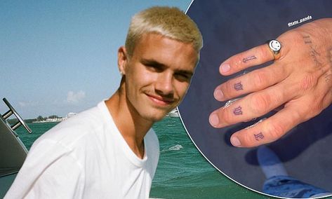 Romeo Beckham debuts a brand new tattoo Romeo Beckham Tattoo, Knuckle Tattoo, Brand New Tattoos, Boom Clap, Romeo Beckham, Knuckle Tattoos, New Tattoo, On Wednesday, New Tattoos