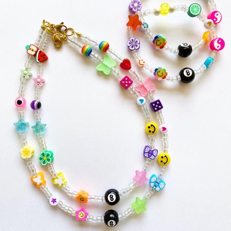 Fun Beaded Necklaces, Trendy Beaded Jewelry, Trendy Beaded Necklace, Heart Smiley Face, Evil Eye Butterfly, Yin Yang Heart, Fun Necklaces, Rainbow Beaded Necklace, Smiley Face Necklace