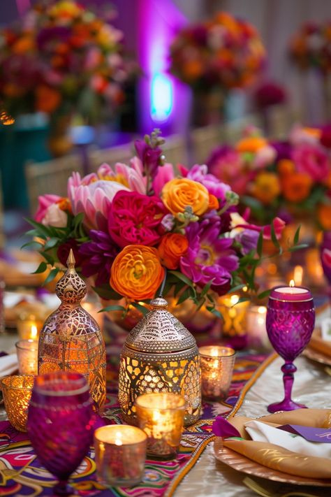 Infuse your event with the exotic charm of Morocco through our captivating table centerpieces, each a vibrant tapestry of colors and patterns. Contact us at  +91 8667799100 to craft your dream wedding with a touch of Moroccan magic. Moroccan Mehendi Decor, Pakistani Wedding Centerpieces, Mendhi Table Decoration, Indian Table Centerpieces, Moroccan Birthday Party Ideas, Hindu Party Decoration, Moroccan Event Decor, Hindu Wedding Centerpieces, Moroccan Theme Party Decor