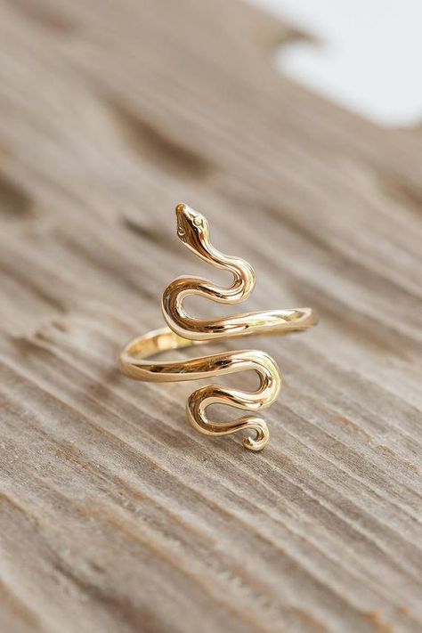 Adjustable bronze snake statement ring. Featured on Buzzfeed gift guide and our best-seller