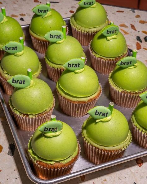 Flavourtown Bakery - Cakes Cupcakes. on Instagram: "💚🤑🔫🌴🐢🍏 It’s B R A T o’clock 💚⁣
⁣
‘Brat is about making a statement, it’s who I am’ ⁣
⁣
🍏 We’re bringing the B R A T this weekend and wearing it as a badge of honour 😝. You know who we are and what we do by now, so just making a green cupcake wasn’t enough obvs 🙄 ⁣
⁣
🍏 So we’ve worked in some delectable handmade apple compote and some uhmazing apple custard buttercream - it’s what @charli_xcx would do 🤩⁣
⁣
🍏 Get ur B R A T this weekend at both stores 🔥" Brat Themed Party, Brat Birthday, Brat Party, Birthdays Themes, Custard Buttercream, Apple Compote, Apple Custard, Green Cupcakes, Apple Cupcakes