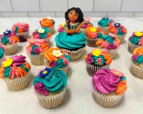 Encanto cupcake set! 🌸🌺🌼 #encantocupcakes #kupcakekitchen #wantcake #encantoparty #encantopartyideas #encantodisney #encantocake #customcupcakes #customcupcake #beautifulcupcakes #amazingcupcakes #cupcakeshop #cupcakery #cupcakequeen #cupcakedesign #cupcakeparty #cupcakeideas #cupcakeinspo #cupcakeinspiration #cupcakebouquet #cupcakesdaily #giftideasforkids #glutenfreecupcakes #santaclarita #santaclaritavalley #santaclaritafoodies #scv #scvcakes #scvfoodies #scvsmallbusiness Mirabel Birthday Cake, Encanto Cupcakes Ideas, Cupcakes Encanto, Encanto Treats, Encanto Cupcakes, Mexican Themed Cakes, Cupcakes Princesas, Encanto Cake, Encanto Birthday