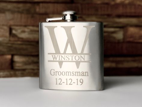 Personalized Engraved Stainless Steel Flask! This is a perfect personalized gift for your loved ones! Choose the Letter Monogram you want, the name you want in it (Up to 10 Characters) and what text you want below it.  6 Ounce Flask Stainless Steel Cheap Groomsmen Gifts, Groomsmen Bottle Opener, Silver Flask, Groomsmen Gifts Flask, Groomsmen Proposal Gifts, Groomsmen Flask, Custom Flask, Engraved Flasks, Flask Set