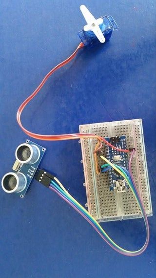 Arduino and Ultrasonic Sensor Control Servo and Distance Meter - Instructables Stepper Motor Arduino, Arduino Home Automation, Arduino Sensors, Makey Makey, Arduino Projects Diy, Ho Train Layouts, Arduino Programming, Circuit Board Design, Robotics Projects