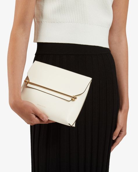 A truly timeless silhouette, the Stylist is designed to take you effortlessly from day to night. Featuring our signature Strathberry music bar as a functional closure, this soft, structured clutch offers ample storage for all your evening essentials. The definition of versatility, this large purse can be transformed into a crossbody bag, when worn with the detachable gold chain strap. Beautiful Wardrobe, Music Bar, Large Purse, Structured Design, Leather Clutch Bag, Leather Clutch Bags, Evening Clutch, Travel Companion, Leather Clutch