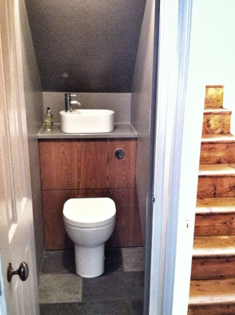 A tiny toilet and sink in one unit for under the stairs. Compact Downstairs Toilet, Turn Closet Into Bathroom, Toilet Basin Combo, Compact Washroom Ideas, Tiny Downstairs Toilet Ideas, Closet Toilet Ideas, Cursed Toilet, Tiny Toilets, Sink Toilet Combo