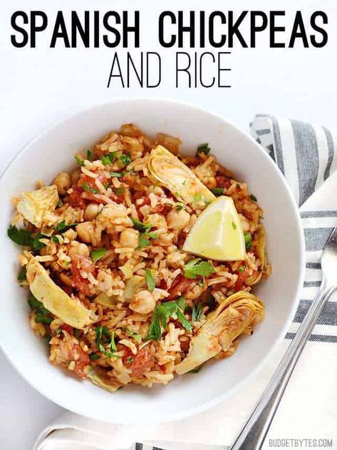 This one pot Spanish Chickpeas and rice has big flavor thanks to liberal dose of spices, artichoke hearts, and fresh lemon. Budgetbytes.com Spanish Chickpeas, Chickpeas And Rice, Quirky Cooking, Budget Bytes, Frugal Meals, Meatless Meals, One Pot Meals, Chickpeas, Vegetarian Dishes