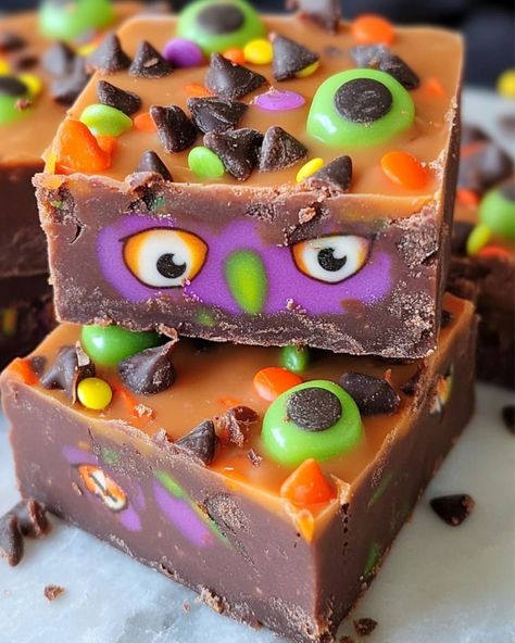 Halloween Monster Mash Fudge Recipe 🎃👀 Ingredients: - 1 (14 oz) can sweetened condensed milk, divided - 1 1/2 cups semi-sweet or milk chocolate chips - 1 1/2 cups white chocolate chips - Food coloring of choice (neon green and purple recommended) - Halloween sprinkles - Candy eye sprinkles Instructions: 1. Line an 8-inch square baking dish with parchment paper, leaving the ends hanging over the sides for easy removal later. 2. In a medium saucepan, add 2/3 cup of the sweetened condensed ... Chips Food, Holiday Fudge, Halloween Sprinkles, Cottage Cheese Recipes, Fudge Recipe, Chips Recipe, Monster Mash, Halloween Monster, Milk Chocolate Chips