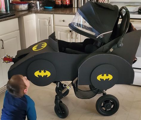 Halloween Stroller Ideas, Stroller Car Costume, Wheelchair Halloween Costumes Kids, Diy Batmobile, Batmobile Halloween Wagon, Baby Stroller Costume, Diy Batmobile Wagon, Stroller Halloween Costumes, Batman Nursery