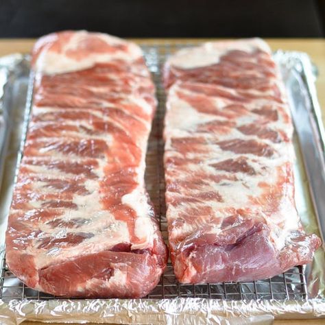 Everything About Pork Spareribs: How to Buy Them and Cook Them to Perfection | Kitchn Slow Cooked Spare Ribs In Oven, Ribs In The Oven, Ribs Recipes, Ribs In Oven, Oven Baked Ribs, Tender Ribs, How To Cook Ribs, Rib Meat, Baked Ribs