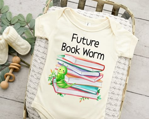 Baby Library Ideas, Bookworm Baby Shower Ideas, Book Club Baby Shower Theme, Storybook Baby Shower Themes, Book Baby Shower Theme Decorations, Book Themed Baby Shower Ideas Decoration, Baby Library, Book Pregnancy Announcement, Storybook Baby Shower Theme Decoration