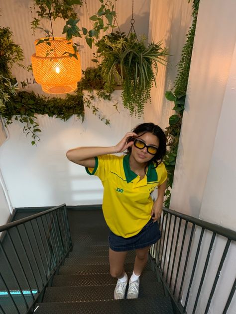 Yellow Adidas Shoes Outfit, Styling A Soccer Jersey, Football Jersey And Skirt Outfit, Oversized Soccer Jersey Outfit Women, Brasil Shirt Outfit, Jersey Outfit With Skirt, Brasil Jersey Outfit, Yellow Jersey Outfit, Cute Jersey Outfits For Women