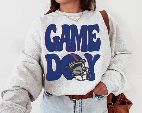 "WELCOME TO MY STORE ♥️ This New York Giant, Giants Football, NY Giant Sweatshirt, Big Blue Shirt, G-Men, Jints Shirt, Sunday Football, Game Day Shirt, Football Lovers, Gift for her, Gift for him, Sports Gift, American Football , Super Bowl Shirt, Christmas Gifts, Birthday Gift, Giant Sweatshirt, New York Football Crewneck, NY Giant Sweatshirt, Vintage New York Football Shirt, New York Fan Gift, New York T-Shirt. *Please check Color and Size Charts before placing the order. You can find them in Packer Sweatshirt, Football Crewneck, Game Day Sweatshirt, Sunday Football, Buffalo Football, Buffalo Games, New York Football, Football Sunday, Cowboys Football