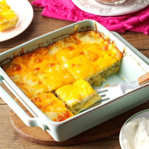 My family requests this chiles rellenos dish regularly—it's easy to prepare and makes a nice hors d'oeuvre or complement to a Mexican or Spanish meal. A friend I worked with shared the recipe with me several years ago. —Fran Carll, Long Beach, California Spanish Meal, Chili Relleno, 8x8 Pan, Chile Relleno, Scalloped Potato Recipes, Square Recipes, How To Cook Shrimp, Mexican Dishes, Taste Of Home