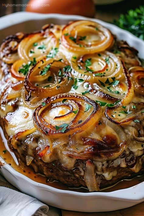 This French Onion Meatloaf is a culinary masterpiece, blending the sweetness of caramelized onions with the hearty texture of meatloaf. A golden crust, with a secret layer of melted cheese within, promises a flavor that's both comforting and sophisticated. Meatloaf Ideas Dinners, 3 Meat Meatloaf, Unique Meals, Cooked Onions, French Onion Meatloaf, The Best Meatloaf Recipe, Meatloaf Casserole, Diner Ideas, Delicious Meatloaf