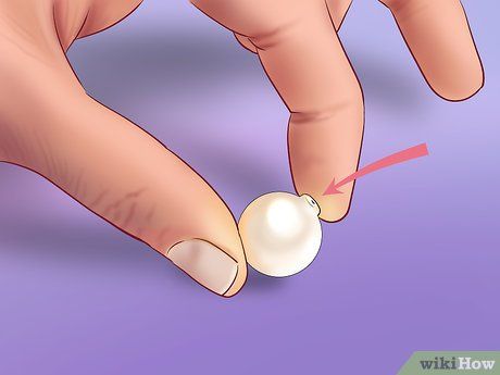 4 Ways to Tell if a Pearl Is Real - wikiHow Diy Pearl Jewelry, Pearls Jewelry Diy, Antique Pearl Necklace, Vintage Pearl Jewelry, Modern Pearl Earrings, Modern Pearl Jewelry, Diy Pearl Necklace, Handmade Pearl Jewelry, Real Pearl Jewellery