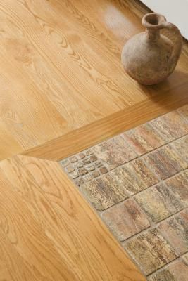 How to Mix Hardwood and Ceramic Tile Flooring in Different Rooms Floor Transition, Transition Flooring, Entryway Tile, Entryway Flooring, Wood Tile Floors, Fireplace Hearth, Ceramic Floor Tiles, How To Mix, Tile Flooring