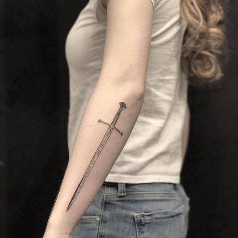 Sword tattoo on the left forearm. Broadsword Tattoo, Aesthetic Forearm Tattoo, Shield Tattoo Women, Dagger Forearm Tattoo, Anduril Tattoo, Excalibur Tattoo, Ogham Tattoo, Back Of Forearm Tattoo, Swords Tattoo