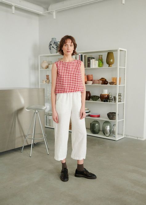 "The Crop top is a summer essential that goes well with other pieces in different shapes. Because of its heavy-looking wide hem and bust darts, the top helps you create an outstanding yet simple look that you can easily adjust for the occasion by playing around with additional layers or accessories. SIZING & FIT This garment is true to size, and we recommend choosing the size you usually wear. If you want the garment to be loose-fitting, choose a larger size than you usually wear. Before pla Blouse Tank Top Outfits, Gingham Sleeveless Top, Red Gingham Top Outfit, Red Blouse Outfit, Gingham Top Outfit, Red Gingham Top, Wife Style, Gingham Linen, Gingham Top