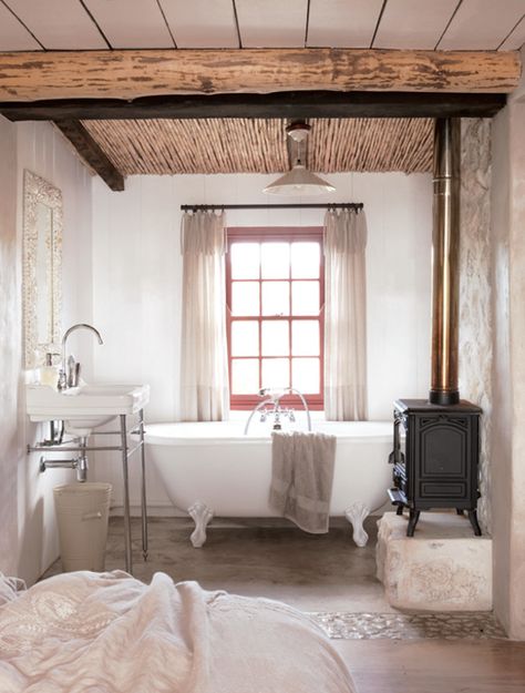 A wood burning stove by the bathtub?!  Oh yes!  All it's missing now is a flatscreen on the wall!  I'd never leave the tub! Cottage Bathroom, Wood Burner, Clawfoot Tub, Beach Cottage, Farmhouse Bathroom, Wood Burning Stove, Beautiful Bathrooms, Bathroom Inspiration, My Dream Home