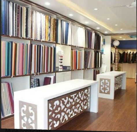 Shop Counter Design Clothes, Readymade Shop Interior Design, Garments Shop Counter Design, Clothing Store Counter Design, Store Counter Design, Fabric Shop Display, Mobile Shop Design, Shop Counter Design, Fabric Store Design