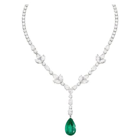 This magnificent necklace features an exquisite deep green emerald weighing 15.43 carat, delicately suspended from a line of pear cut, marquise and round white diamonds representing a lovely flower motif. The elegant proportion showcases the rich, green gemstone in all of it's magnificence without the need for superfluous elaboration. Signed, numbered, and complete with the original records from AGL the prestigious laboratory this necklace is real heirloom jewerly piece! Green Diamond Necklace, Rose Cut Diamond Pendant, Art Deco Pendant Necklace, Emerald Green Necklace, Emerald Diamond Earrings, Noble Lady, Marquise Shape Diamond, Heart Necklace Diamond, Diamond Jewelry Designs