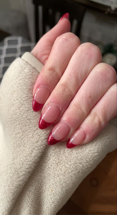 Red Shimmer French Tip Nails, Holiday Nails French Tip Sparkle, Christmas Almond French Tip Nails, Sparkly Red French Tip Nails Almond, Sparkly Red Tip Nails, Red Glitter French Tip Nails Almond, Sparkle Red French Tip, Red Sparkle French Tip, Red Sparkly French Tip Nails