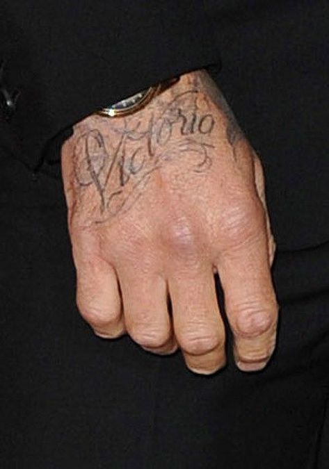 David Beckham’s 63 Tattoos & Their Meanings | Body Art Guru Beckham Neck Tattoo, David Beckham Neck Tattoo, Tattoos On Hands, Hand Tattoo Images, Upper Back Tattoos, Native Tattoos, Victoria And David, Fire Tattoo, Laser Tattoo Removal