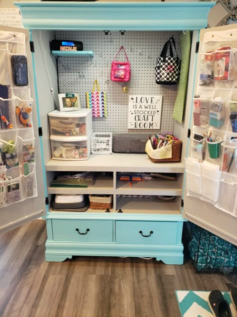 Repurposed armoire to craft cabinet for $134! $100 for cabinet, sanded, primed, painted and added peg board and hooks for $16, two shoe organizers for $8 and under cabinet lighting for $10!! Stores all Cricut, paint, scrapbook and crafting supplies! Armoire Craft Cabinet Diy Cricut, Diy Craft Storage Cabinet Organizing Ideas, Armoire Into Craft Cabinet, Armoire Repurpose Craft Storage, Cricut Craft Cabinet, Armoire Makeover Craft Storage, Armoire To Craft Cabinet, Cricut Storage Cabinet, Cricut Cabinet Storage