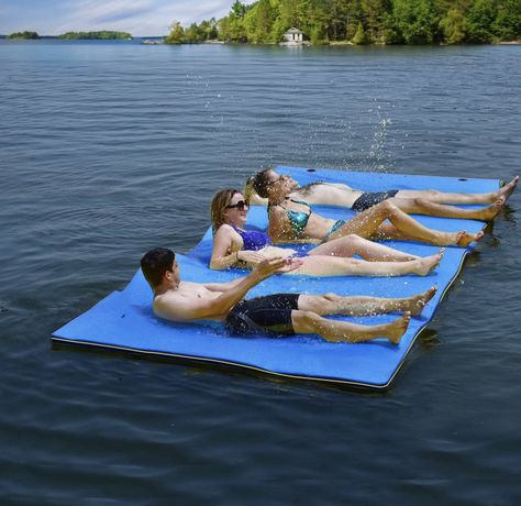 This swim water pad is made of highquality 3-layer XPE foam, which provides superior stability and comfort on water. You can relax your head on the pillow (9 ft only) and allow cooling water pad cradles your body just below the surface of the water, keeping you cool on hot summer days. This versatile swim platform can be used as a lounge, swim raft,or a launch pad for any water sports. Amazon affiliate link below: Good Gifts For Parents, Floating Mat, Water Pad, Water Mat, Pool Rafts, Floating Water, Floating Island, Roll Pillow, Lake Time