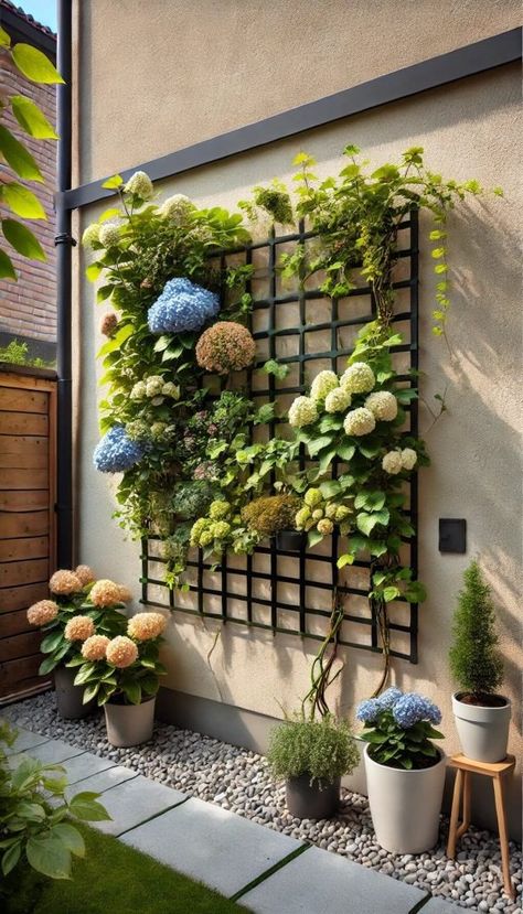 10 Stunning Fence Trellis Ideas to Transform Your Garden 24 Hanging Plants On Wall Outdoor, Outside Window Decor Exterior Design, Condo Patio Decorating Ideas, Yard Wall Ideas, Garden Fence Decoration Ideas, Backyard Trellis Ideas, Pool Trellis, Plants On Fence, Outdoor Feature Wall Ideas