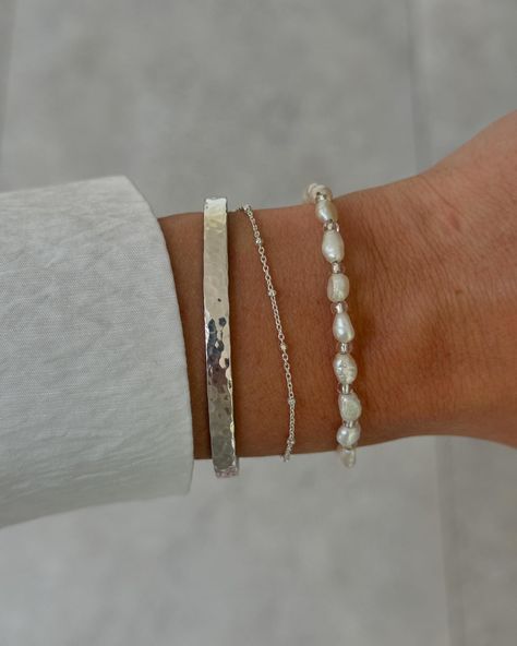 Beaded bracelets and necklaces are now available 💚 Add some colour to your wrist stack this summer ☀️ Choose from Pearl, blue or red 💫 #summerstyling #summerjewellery #beadedbracelets #wriststack #handmadejewellery #silverjewellery #silverbracelet Classy Silver Bracelets, Dainty Silver Bracelet Stack, Silver Wrist Stack, Bracelet Stacks Silver, Trendy Silver Bracelets, Beaded Bracelets With Words, Jewelry Inspo Silver, Silver Jewelry Stack, Silver Necklace Stack