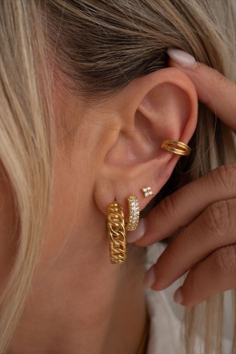 Perfect your earring stack with our Kira Hoops, Pave Gold Baby Hoops, Raye Studs, and our Rowan Cuff Earring Stack Studs, Gold Earring Placement, Ear Piercings For Pointy Ears, Three Hole Earring Stack, Gold Hoop Earring Stack, Gold Hoop Stack, Gold Jewelry Earring Stack, Gold Double Piercing, Triple Stack Earrings