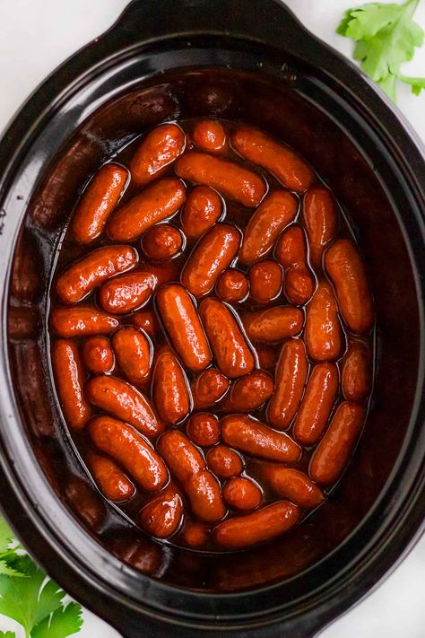 These easy 3-ingredient little smokies are cocktail sausages cooked in a sweet and tangy barbecue sauce in the slow cooker. They are perfect for parties and entertaining as they're so tasty and fun to eat, and everyone loves them! Cocktail Sausage Recipes, Lil Smokies Recipes, Crockpot Little Smokies, Cocktail Weenies, Little Smokies Recipes, Easy Delicious Appetizers, Smokies Recipe, Little Smokies, Lil Smokies