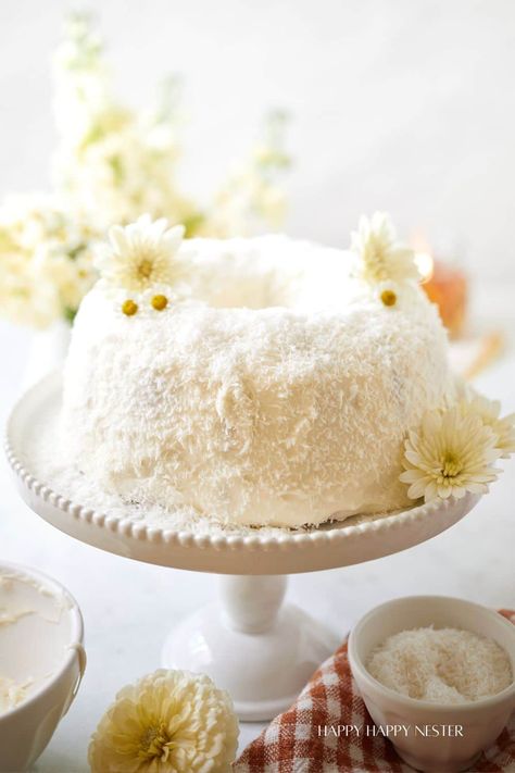 White Chocolate Coconut Bundt Cake, Coconut Bundt Cake, Chocolate Chip Frosting, White Cake Stand, Brunch Desserts, Bundt Cake Recipe, Coconut Cake Recipe, Coconut Frosting, Homemade Dessert