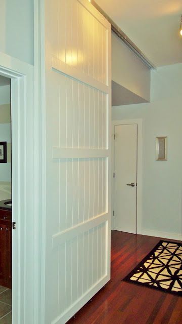 Sliding Doors- I need this to temporary close off a section of the house. I am going to make a small version then maybe upscale it. Loft Doors, Temporary Door, Loft Door, Dog Gates, Diy Sliding Door, Dog Gate, Rustic Doors, Home Doors, Room Decorating