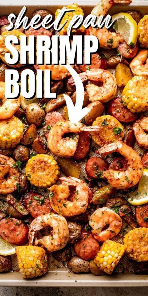 Super-easy and perfect for a busy weeknight, this Sheet Pan Shrimp Boil is a quick oven-baked version of the Southern classic! Jumbo shrimp, andouille sausage, potatoes, and corn are coated with a buttery garlic spice mixture and baked to a juicy perfection. Sheet Pan Shrimp Bake, Shrimp Boil Oven, Seafood Boil Oven Recipe, Easy Southern Boil, Oven Baked Seafood Boil, Seafood Oven Boil, Seafood Boil Oven, Low Country Seafood Boil Recipe, Shrimp Boil Baked In Oven