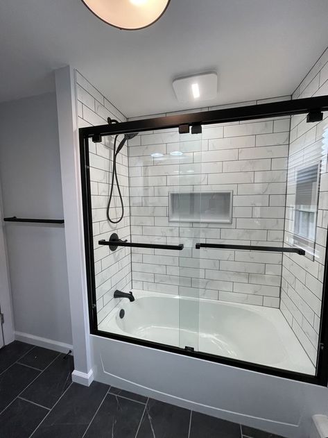 Shower With Tub And Glass Door, Black Frame Shower Door With Tub, Black Tub Door, Adding Glass Door To Bathtub, Small Bathroom Ideas Glass Shower Door, Bathroom Tubs And Showers, Shower Door Ideas With Tub, Modern Shower With Tub, Luxury Shower Tub Combo