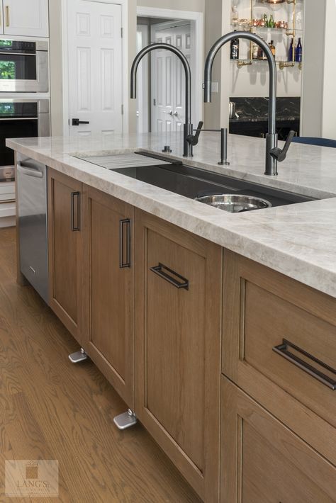 In this stunning #kitchendesign, the sink is transformed into a multi-functional work zone with @TheGalleyBrands Ideal Kitchen Workstation, complete with graphite accessories and two Galley Taps. ✔️Find out more about the Galley on our website. https://langskitchens.com/the-galley ✔️ Then call us at 215-968-5300 schedule an appointment with our team. Galley Kitchen Sink Workstation, Galley Sink In Island, The Galley Sink, The Galley Sink Workstation, Galley Sink Workstation, Two Sinks In Kitchen, Galley Kitchen Sink, Farmhouse Galley Kitchen, Kitchen Workstation