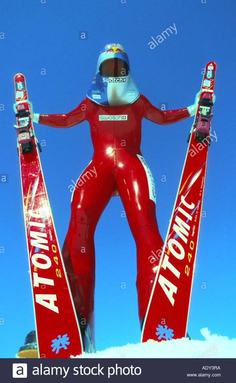 Download this stock image: high speed skiing, wearing racing suit and helmet, holding ski - ADY3RA from Alamy's library of millions of high resolution stock photos, illustrations and vectors. Cat Jumpsuit, Vintage Skis, Vintage Skiing, Triathlon Wetsuit, Winter Things, Ski Racing, Retro Ski, Female Mask, Female Superhero