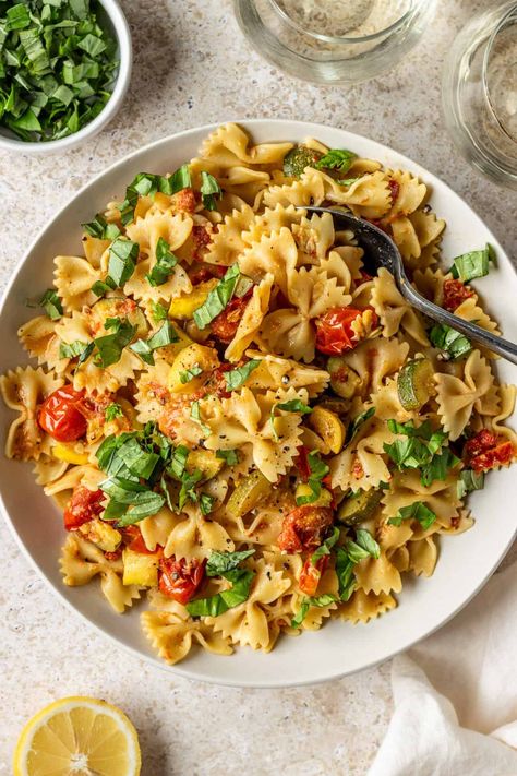 Summer Squash and Tomato Farfalle Pasta | Toshi's Table Pasta With Summer Squash, Pasta With Grape Tomatoes, Pasta Cherry Tomatoes, Sauteed Summer Squash, Summer Squash Pasta, Storing Seeds, Light Pasta Dishes, Summer Squash Recipes, Yellow Squash Recipes