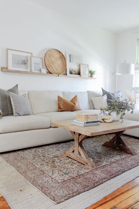 Two Rugs Living Room, Coffee Table With Light Gray Couch, White And Wood Living Room Small Spaces, Left Arm Sectional Living Rooms, Small Living Space Decor, Wall Next To Couch Decor, Wall Art Small Living Room, Small House Wall Decor, White Walls White Couch