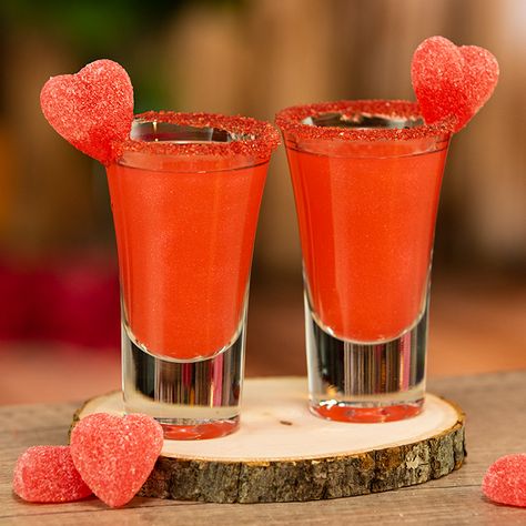 Valentine's cocktail recipes do not get better than this Red Hot Valentine's Shot, trust us. These beautiful little red Valentine's Day mixed drinks combine Fireball, cherry vodka, grenadine, pearl dust, red sugar, and candy hearts, and are guaranteed to put you in the mood for romance — or at least another red dessert shot. RED HOT VALENTINE'S SHOT 1 Part Fireball 1 Part Cherry Vodka Splash Grenadine Pearl Dust Red Sugar Candy Hearts PREPARATION 1. Rim edge of shot glass wit... Valentines Shots, Valentines Cocktails Drink Recipes, Valentine Drinks, Valentine Cocktails, Cherry Vodka, Shots Alcohol, Tipsy Bartender, Shot Recipes, Cocktail Drinks Recipes