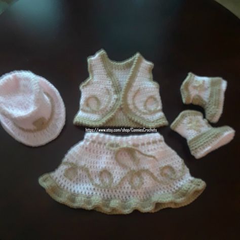 4-piece baby's cowgirl outfit that includes hat, vest, diaper cover/skirt, boots  Perfect gift Crochet Diaper Cover Free Pattern, Baby Cowgirl Outfits, Crochet Newborn Outfits, Cowgirl Skirt, Crochet Diaper Cover, Skirt Boots, Cowgirl Outfit, Crocheted Items, Crochet Vest Pattern