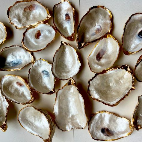 Cape Cod Recycled Repurposed Oyster Shells Made Into Beautiful Ring Trinket Dishes Perfect Gift Or Use In Your Coastal Wedding Each Oyster Is Hand Picked Carefully Cleaned Sealed Painted And Gift Boxed I Have Clear Ones And Pearl Painted Trimmed With Gold And Back Is Natural I Will Be Listing More Decoupaged Ones As Well Each One Measures 3-4 In Made By Me East Coast Salty Vibes Oyster Shell Trinket Dish, Wedding Cake Display Table, Oyster Shells Decor, Wedding Cake Display, Pearl Paint, Oyster Shell Crafts, Shell Collection, East Coast Wedding, Shell Decor