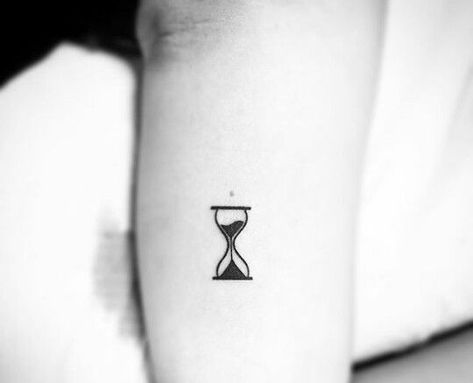 160+ Beautiful Hourglass Tattoos Designs With Meaning (2023) - TattoosBoyGirl Hourglass Tattoo Men Simple, Hourglass Finger Tattoo, Hourglass Small Tattoo, Look Up Tattoo, Minimal Hourglass Tattoo, Tiny Hourglass Tattoo, Hourglass Minimalist Tattoo, Minimalist Hourglass Tattoo, Minimalist Tattoo Men Simple